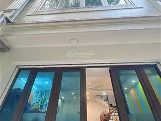 Bán nhà văn cao 5 tầng xây mới dt 33m  20m ra ô tô, 5p ra hồ tây  