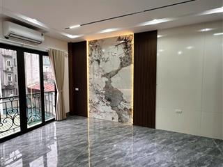 Nhà xây mới cách mặt phố 60 m , có sân để xe  dt 50 m 6 t t máy mt 4,5 m thâm thiên đống đa hn