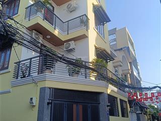 Nhà hót. 4 tầng 6 phòng ngủ. hẻm xe tải 5m. cách nguyễn thị thập 100m. tân quy, q7. giá chỉ 9,6 tỷ