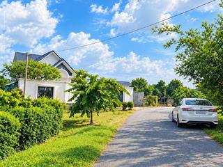 Bán đất vườn thổ cư củ chi 1000m2  mặt tiền nhựa 6m  sổ hồng riêng  giá chỉ từ 2 tr/m2 mặt tiền
