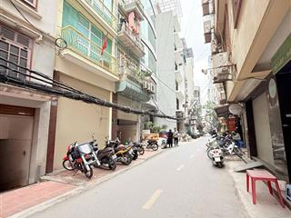 Mặt phố đê la thành nhỏ 68m2 mt 6m 6 tầng + hầm thang máy ô tô 2 thoáng 20 tỷ