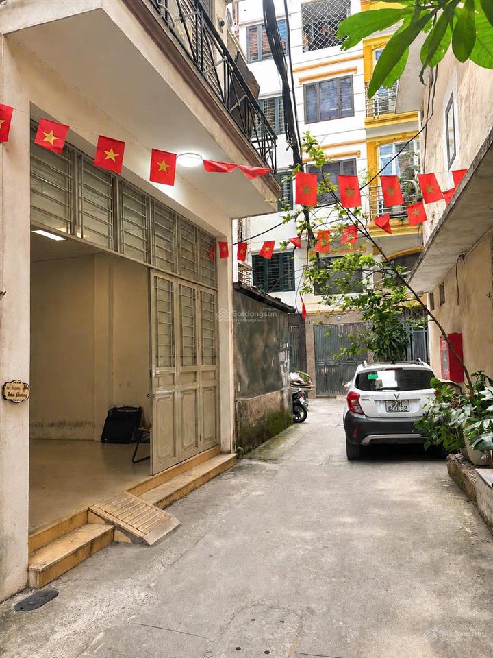 72m tây sơn mặt tiền 5m ngõ thông gara ô tô kinh doanh hiệu quả 23 tỷ.