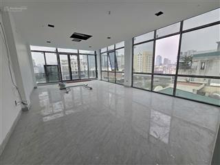 Cho thuê tòa nhà văn phòng full kính đê la thành lớn, 80m2*9t, thông sàn, thang máy, có hầm để xe