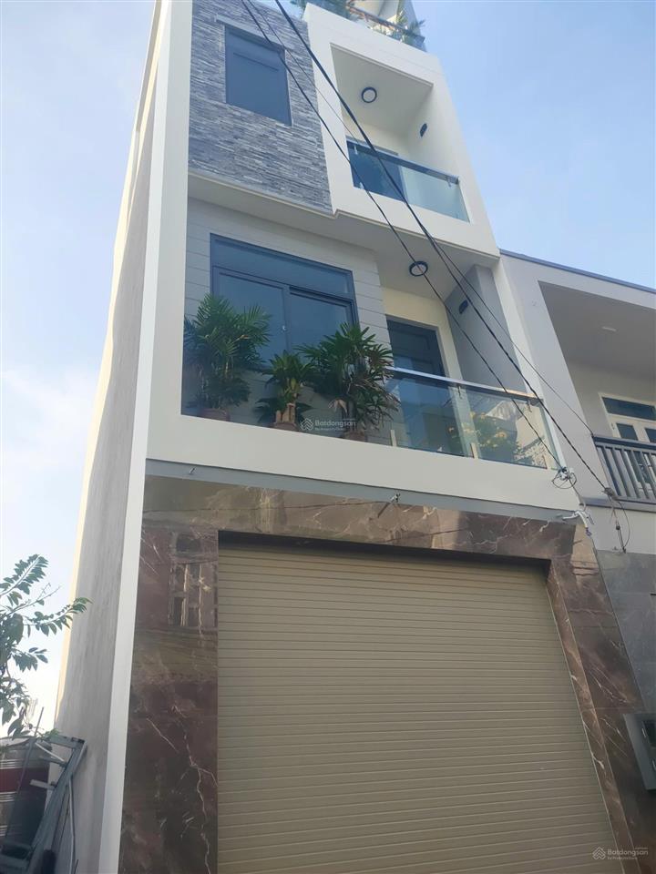 Bán nhà quận 12 chỉ hơn 5ty  đường nhựa 6m xe hơi vào nhà  4 tầng sổ vuông chuẩn.