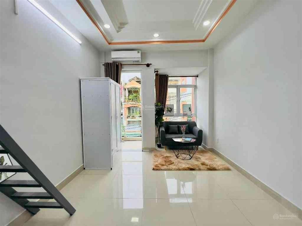 Quận 6  mt đường 12m  dòng tiền 20 tr/th  5 tầng (3.3x20m) 7pn  khu phố ẩm thực chỉ 8.6 tỷ