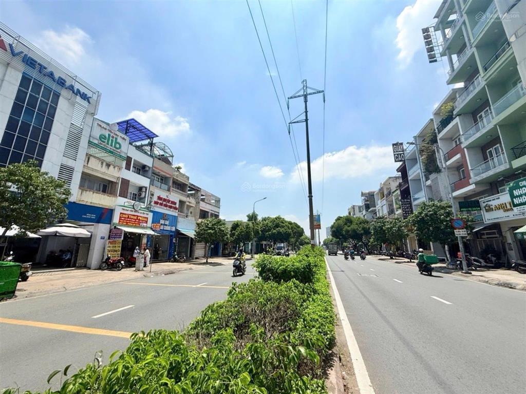 Quận 11  nhà mặt tiền góc lạc long quân  gần đầm sen  87m (6.3x14m) 5 tầng  10 pn  giá 25 tỷ