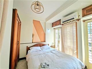 Cho thuê căn hộ dịch vụ mini ban công tách bếp trần hưng đạo quận 1  gần đh sài gòn,đh khoa học tn