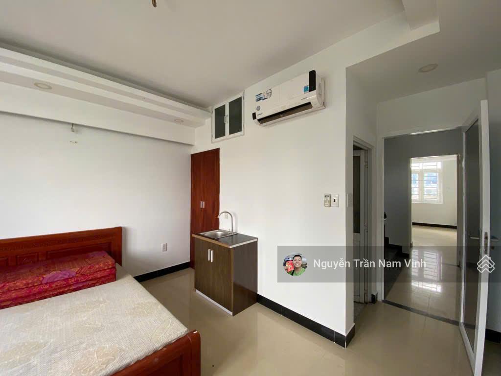 Bán nhà quận 7 đang làm căn hộ dịch vụ 8 phòng có gara để xe 5 tầng ngang 4.5m dài 13m chỉ 6,5 tỷ