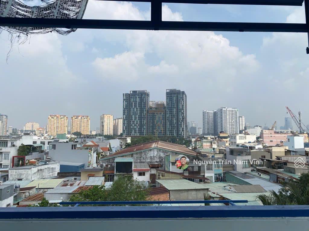 Bán nhà quận 7 đang làm căn hộ dịch vụ 8 phòng có gara để xe 5 tầng ngang 4.5m dài 13m chỉ 6,5 tỷ