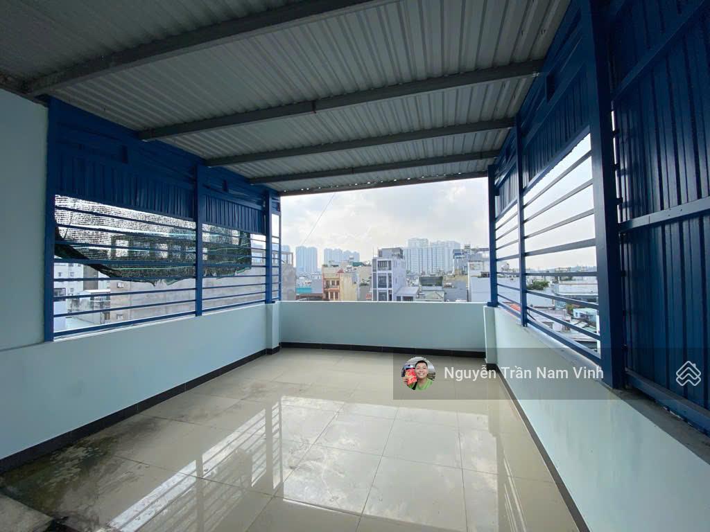 Bán nhà quận 7 đang làm căn hộ dịch vụ 8 phòng có gara để xe 5 tầng ngang 4.5m dài 13m chỉ 6,5 tỷ