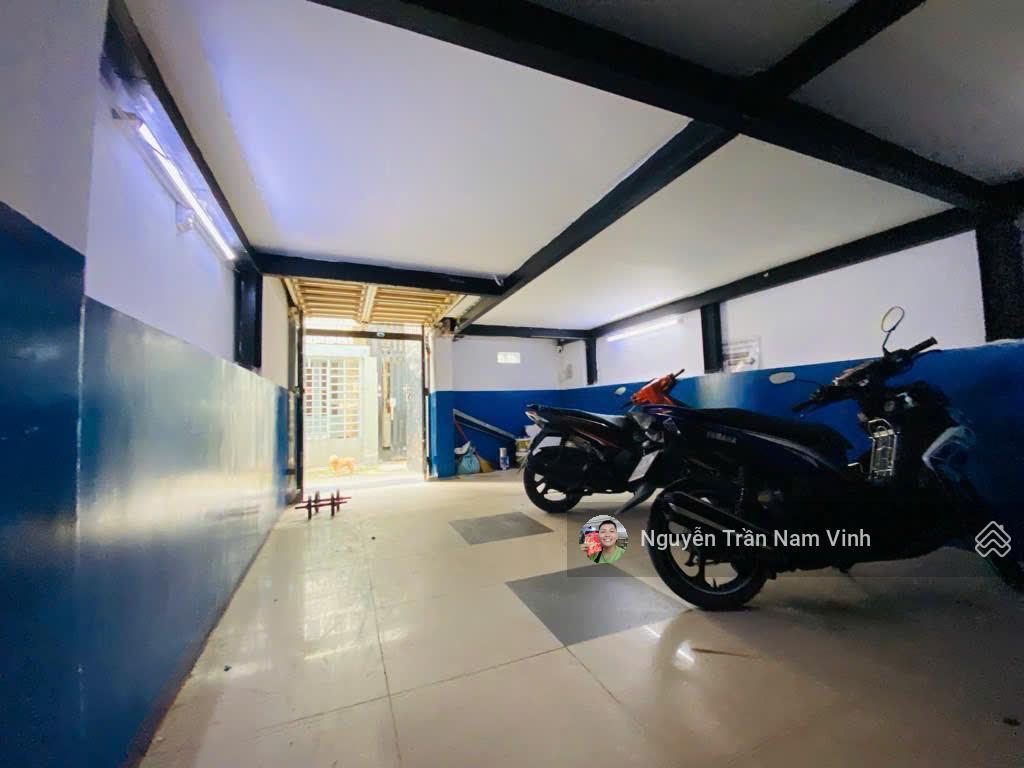 Bán nhà quận 7 đang làm căn hộ dịch vụ 8 phòng có gara để xe 5 tầng ngang 4.5m dài 13m chỉ 6,5 tỷ