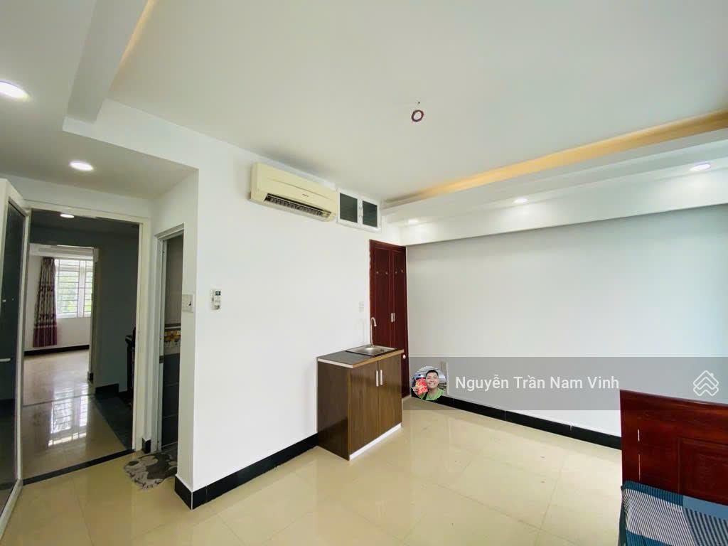 Bán nhà quận 7 đang làm căn hộ dịch vụ 8 phòng có gara để xe 5 tầng ngang 4.5m dài 13m chỉ 6,5 tỷ