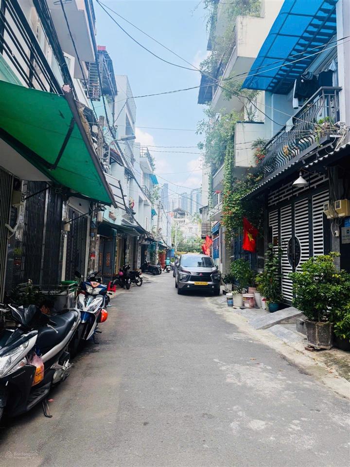 Nhà mt đường nhựa 6m  lý phục man  xe hơi ở trong nhà  nhỉnh 100tr/m