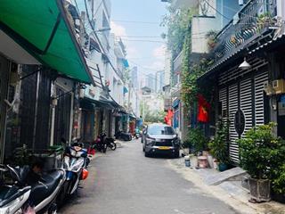 Nhà mt đường nhựa 6m  lý phục man  xe hơi ở trong nhà  nhỉnh 100tr/m