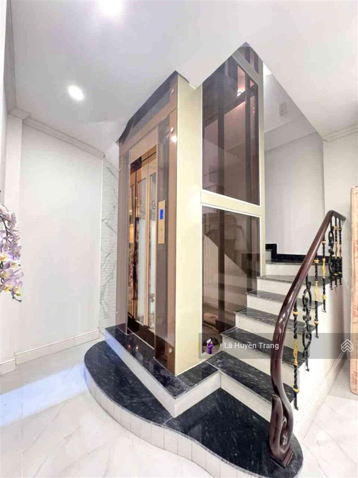 Giá tốt lạc long quân  nhà đẹp ở ngay  75m2 6 tầng thang máy  mặt tiền 7m  ba bước ra hồ tây