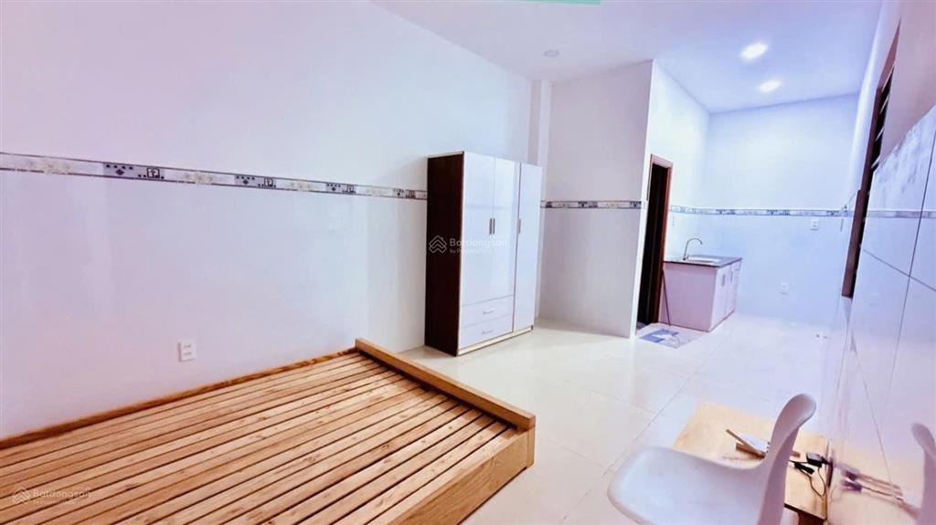Bán chdv 7 tầng 12 phòng thu nhập 60tr/th hẻm ô tô thông sát mt lê đức thọ p. an hội đông chỉ 15t