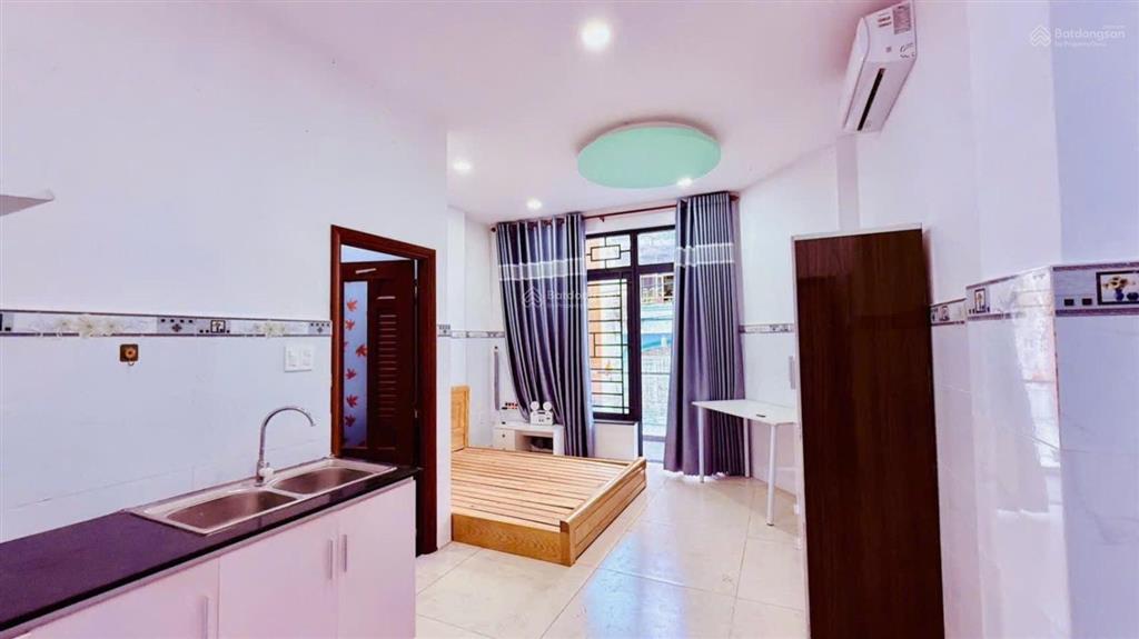 Bán chdv 7 tầng 12 phòng thu nhập 60tr/th hẻm ô tô thông sát mt lê đức thọ p. an hội đông chỉ 15t