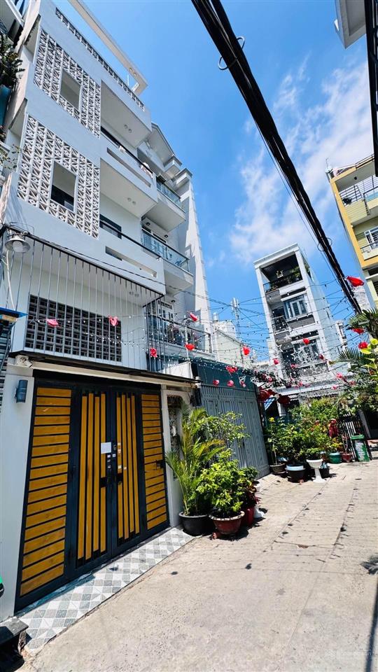 Nhà đẹp 4 tầng rộng 4x18m, vị trí đẹp hẻm ô tô ngay mặt tiền thống nhất phường thông tây hội 9tỷ4