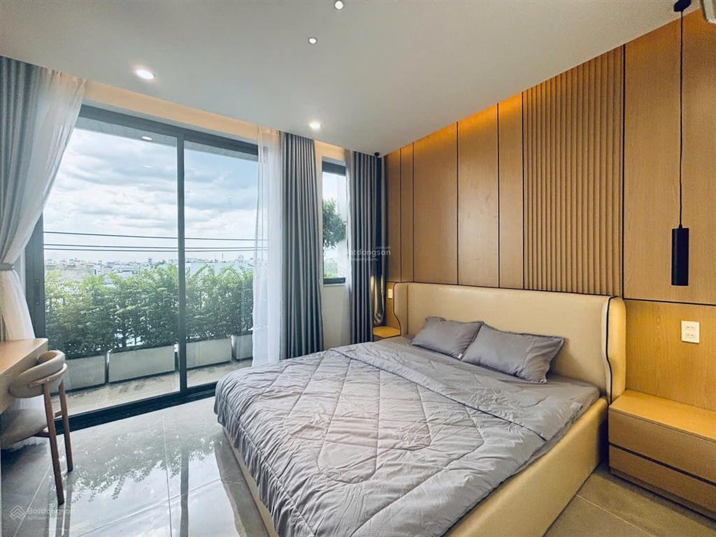 Nhà có thang máy 450kg, mặt tiền đường thạnh lộc 31