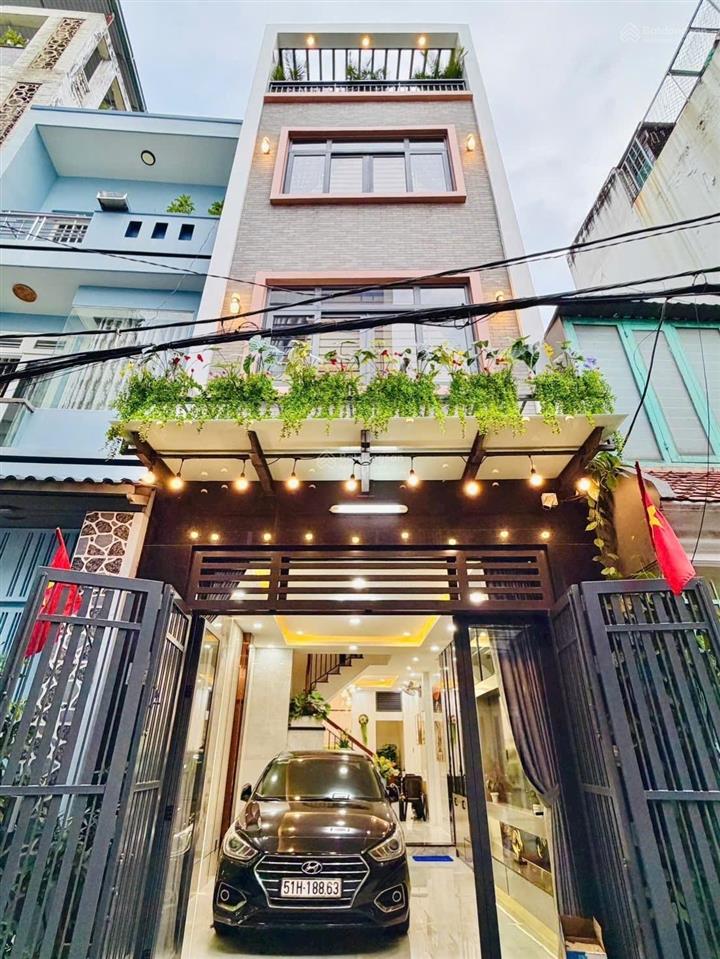 Siêu phẩm nhà phố 4 lầu  sát emart gò vấp  hxh thông, ô tô ngủ trong nhà. giá cực tốt 7 tỷ 890