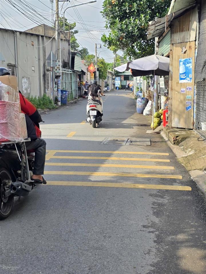 514 bán đất mặt tiền đường trần thị xanh, p. tân đông hiệp, dĩ an gần ttyt dĩ an  93,9m2  3,5 tỷ