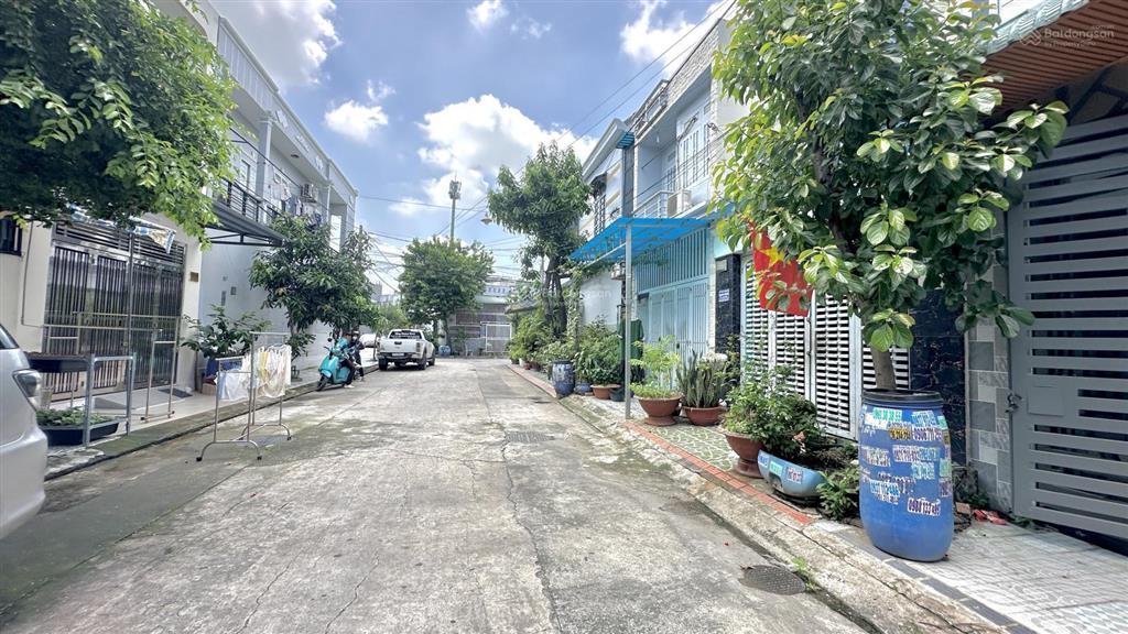 Bán nhà tân đông hiệp gần ngã tư chiêu liêu, 60,6m2, sổ hồng riêng, đường 11m, giá 3,95 tỷ
