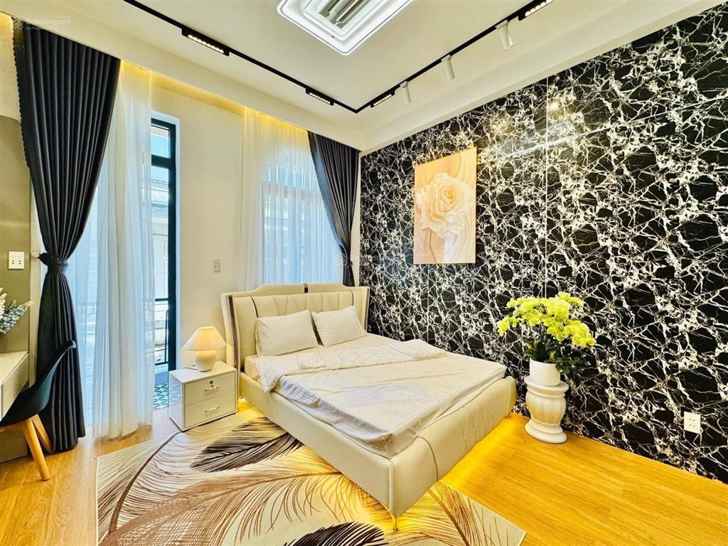 50m ra mt, hẻm 4m 1trục, xh đỗ cửa, 3 tầng kiên cố, 3pn, phòng thờ st. full nt