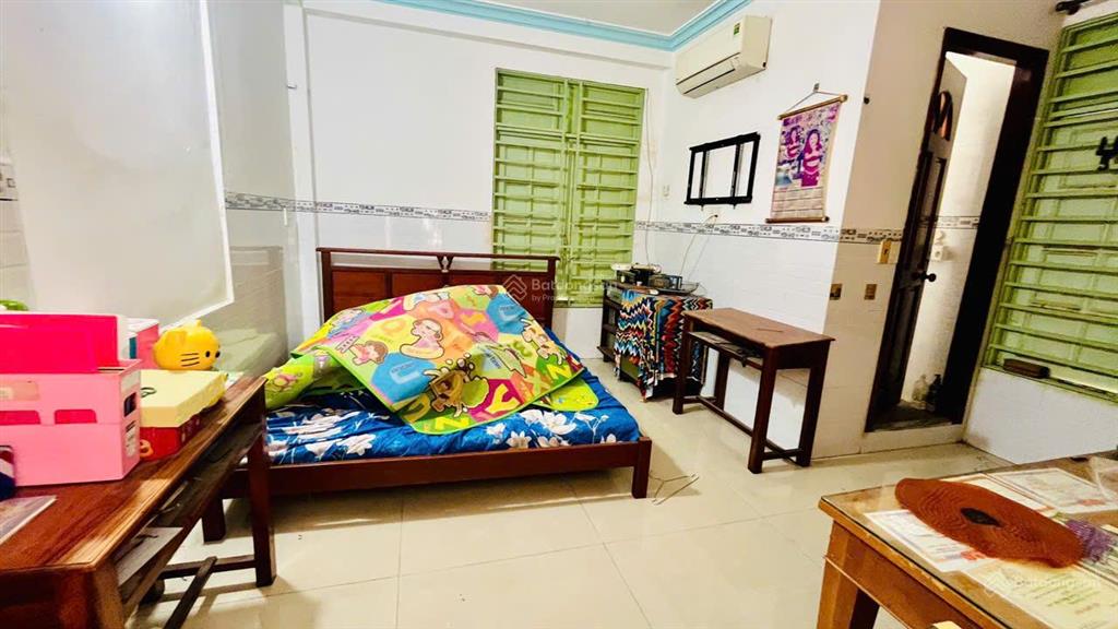 Nhà mặt tiền đường nhựa  ngang 4.5m  4 tầng, 4pn  kinh doanh tốt  chỉ 4.6 tỷ