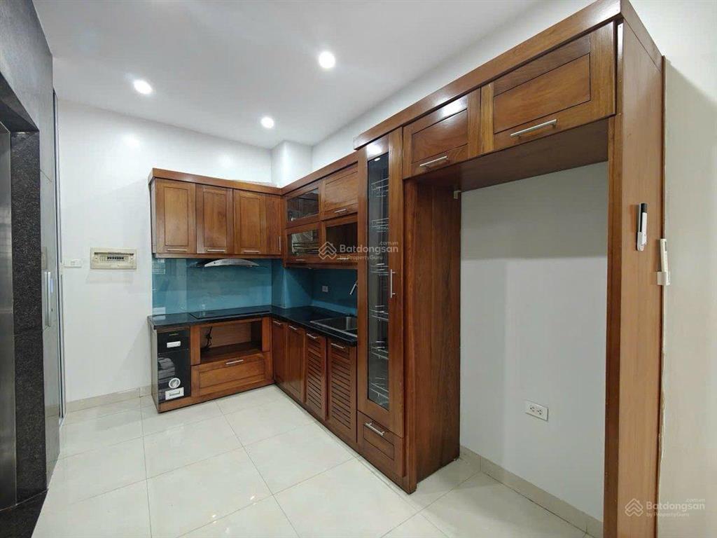 Bán nhà mỹ đình  7 tầng  thang máy  ô tô đỗ trong nhà  dt 43m2  mặt tiền 5.8m  sổ vuông đẹp