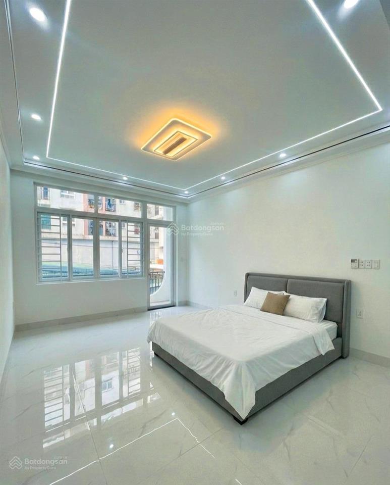 Nhà mới ở ngay 4 tầng btct  hơn 40m2  sổ vuông đẹp  hxh đỗ cửa  cách mt an dương vương 20m.