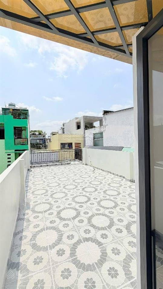 Nhà mới ở ngay 4 tầng btct  hơn 40m2  sổ vuông đẹp  hxh đỗ cửa  cách mt an dương vương 20m.