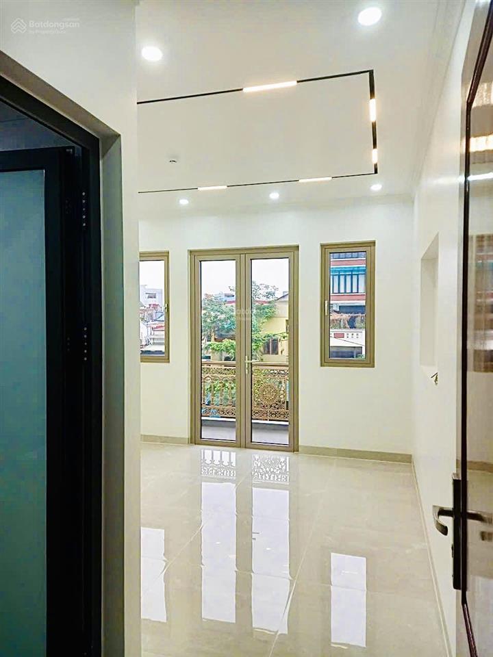 Nhà 6 tầng  thang máy mặt đường tôn đức thắng  55,4m2  mt 4,3m  hè 5m kd sầm uất chợ an đồng