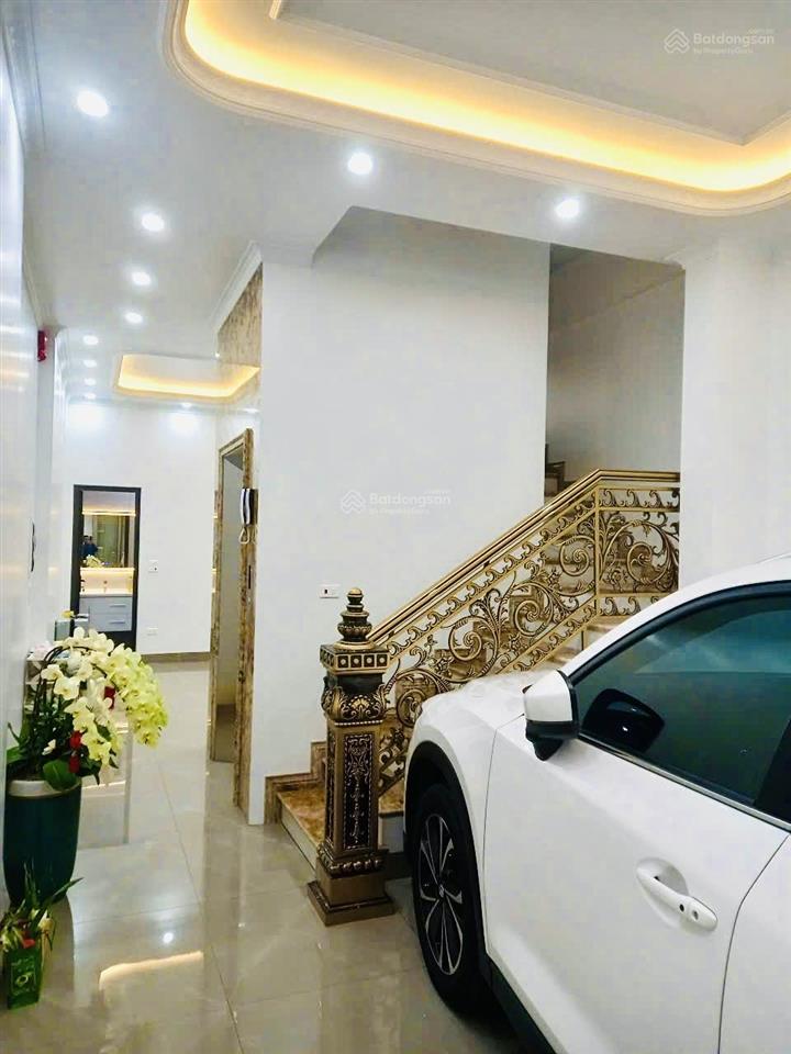 Nhà 6 tầng  thang máy mặt đường tôn đức thắng  55,4m2  mt 4,3m  hè 5m kd sầm uất chợ an đồng