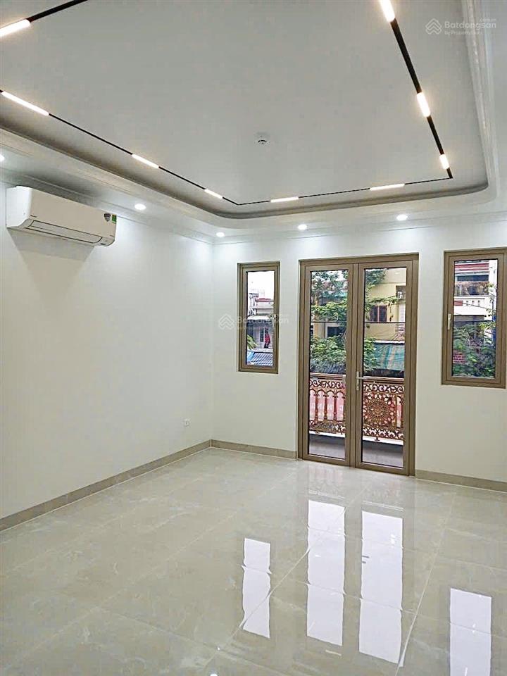 Nhà 6 tầng  thang máy mặt đường tôn đức thắng  55,4m2  mt 4,3m  hè 5m kd sầm uất chợ an đồng