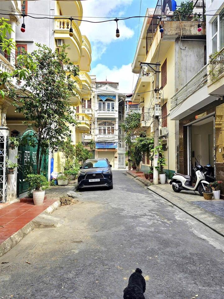 Nhà 4 tầng 70m2 sân cổng nguyễn đức cảnh  ô tô tránh nhau đường 6m  gần hồ tam bạc, bảo vệ 24/24