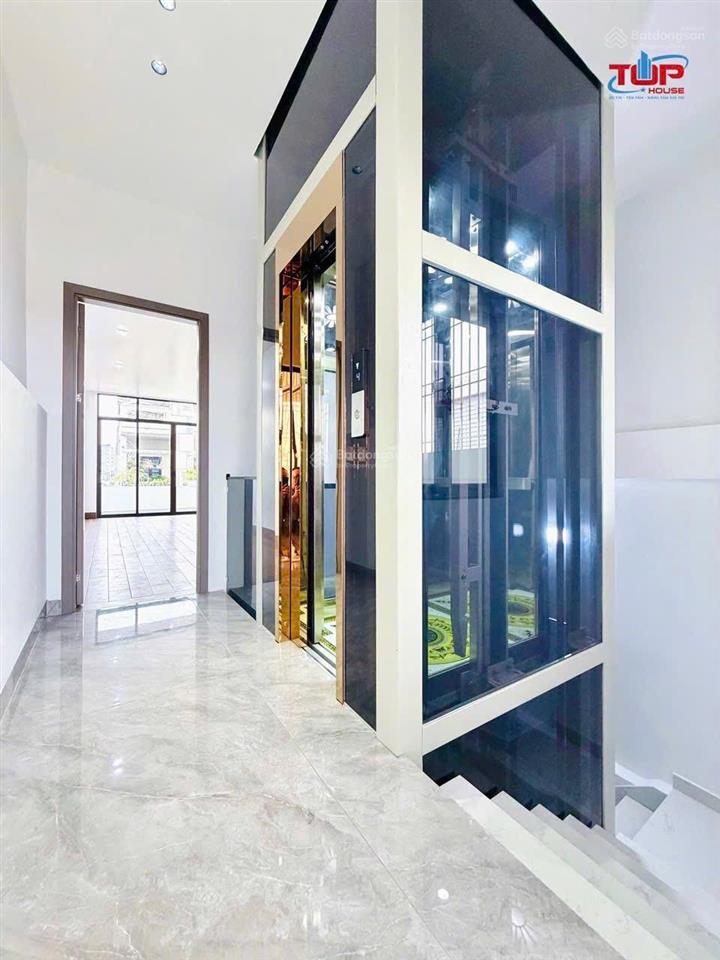 Nhà mới tinh full đồ thang máy 67m²  4 tầng ô tô tránh nhau lê lợi nq sau giáp ngõ