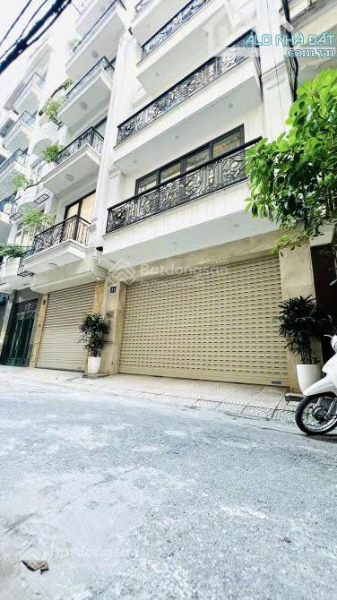 Cho thuê nhà 65m*8 tầng, hào nam, phố ô chợ dừa, quận đống đa, giá 54 triệu.