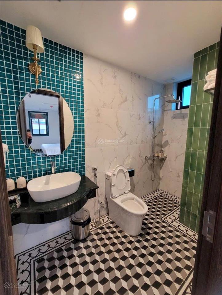 Bán khách sạn 4 sao giảng võ ba đình, 280m, 10 tầng, mt 14m, 50 phòng, doanh thu 1,7 tỷ/tháng
