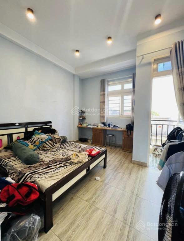 Hẻm 3m, cách 3 căn ra mt rạch xuyên tâm  46m2 ngang 4.2m, 4 tầng.