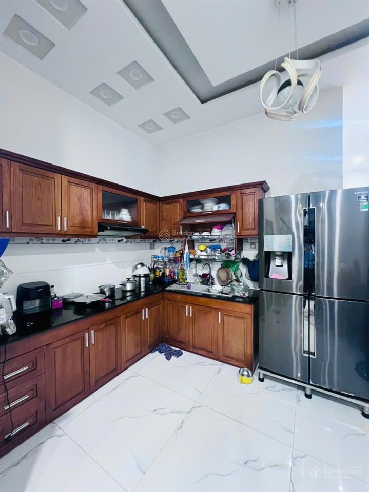 Nhỉnh 65 triệu/m2  bán đất tặng nhà 3 tầng  112m2 ngang 4m2  mặt tiền vip trần thị hè q.12
