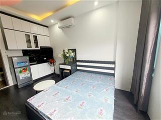 Tòa chdv phố thịnh quang, mt 5m* 22 pkk, dt 100tr/th, 35m ra ôtô tránh đỗ, trước nhà 3 gác tránh.