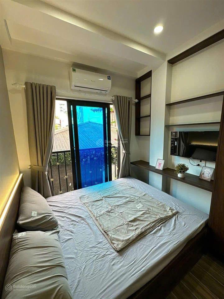 14,9 tỷ. toà ccmn hào nam, 67m2*7t*16pkk, sát ga cát linh,35m ra phố, ngõ 3m . pccc/gpxd, dt 7%/năm