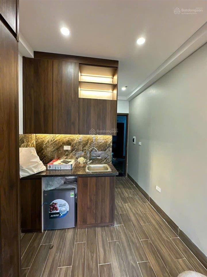 14,9 tỷ. toà ccmn hào nam, 67m2*7t*16pkk, sát ga cát linh,35m ra phố, ngõ 3m . pccc/gpxd, dt 7%/năm