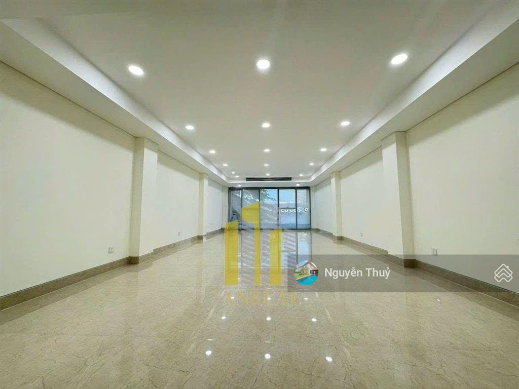 Cho thuê tòa văn phòng hầm 4 lầu trống suốt  thang máy giá 55 triệu