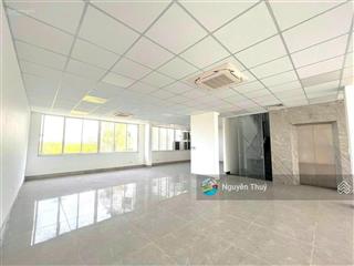 Toà nhà thiết kế văn phòng sàn trống  thang máy 14x22m 3 lầu giá 150 triệu