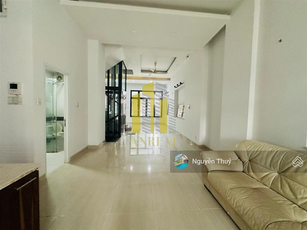 Nhà hầm trệt 1 lầu thang máy  6x23m giá 33 triệu  đường trần não