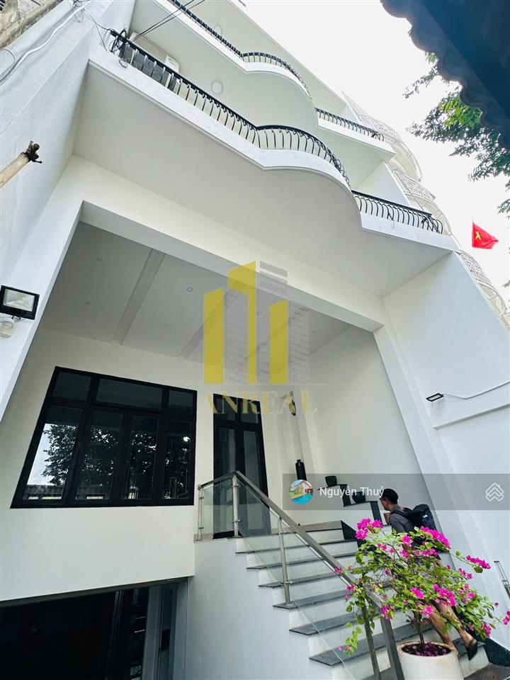 Nhà hầm trệt 1 lầu thang máy  6x23m giá 33 triệu  đường trần não