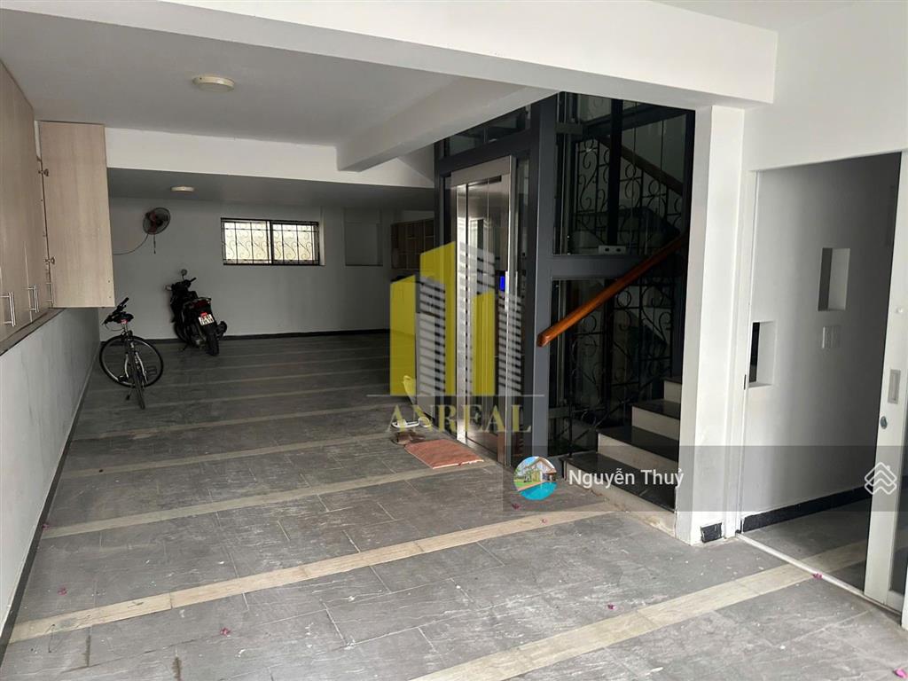 Nhà hầm trệt 1 lầu thang máy  6x23m giá 33 triệu  đường trần não