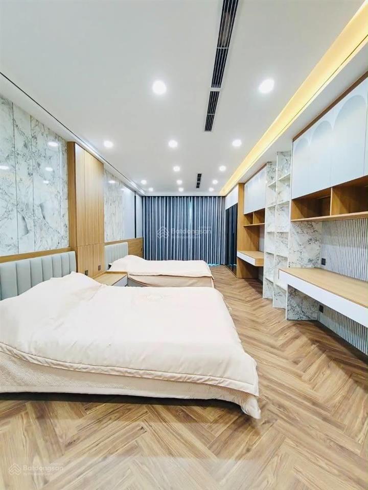 Tòa nhà mặt phố nguyễn văn huyên, thang máy, vỉa hè đá bóng, dt 5%/năm, gpxd, pccc chuẩn, 89m2x9t