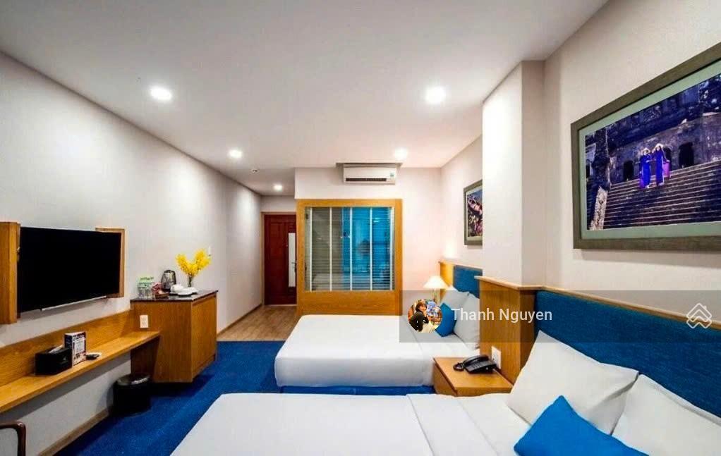 Ngay cửa ngõ sân bay! tòa nhà khách sạn mt trường sơn  15x25m  hầm 7 tầng  hđ 400 tr  150 tỷ